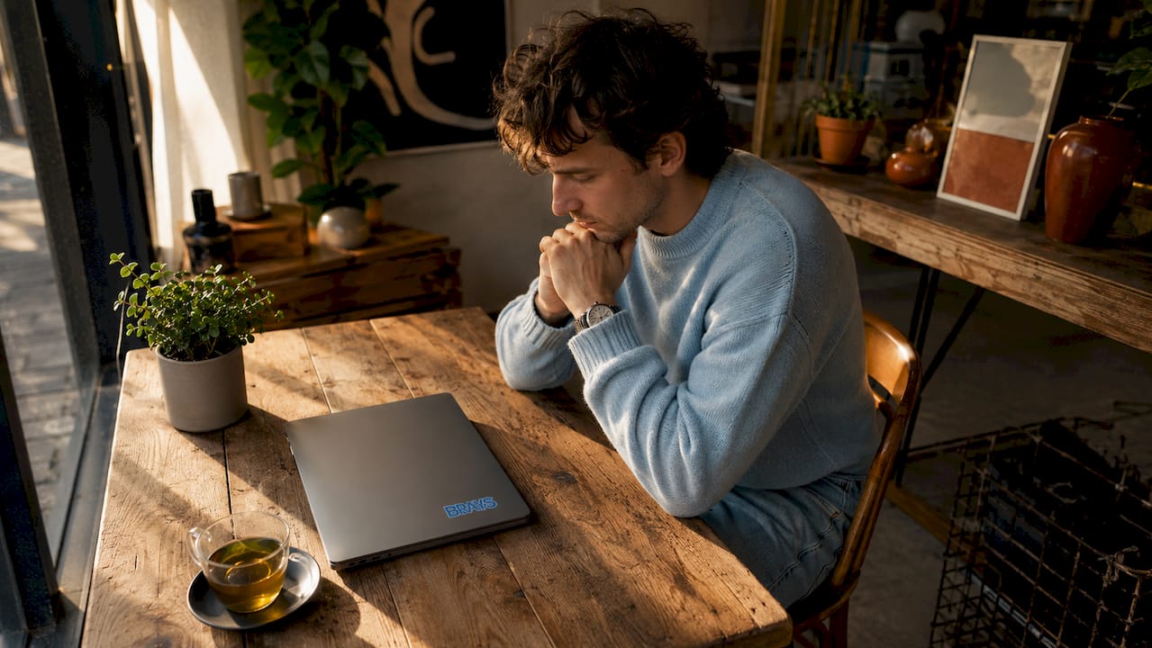 Person at desk considering video sharing platforms